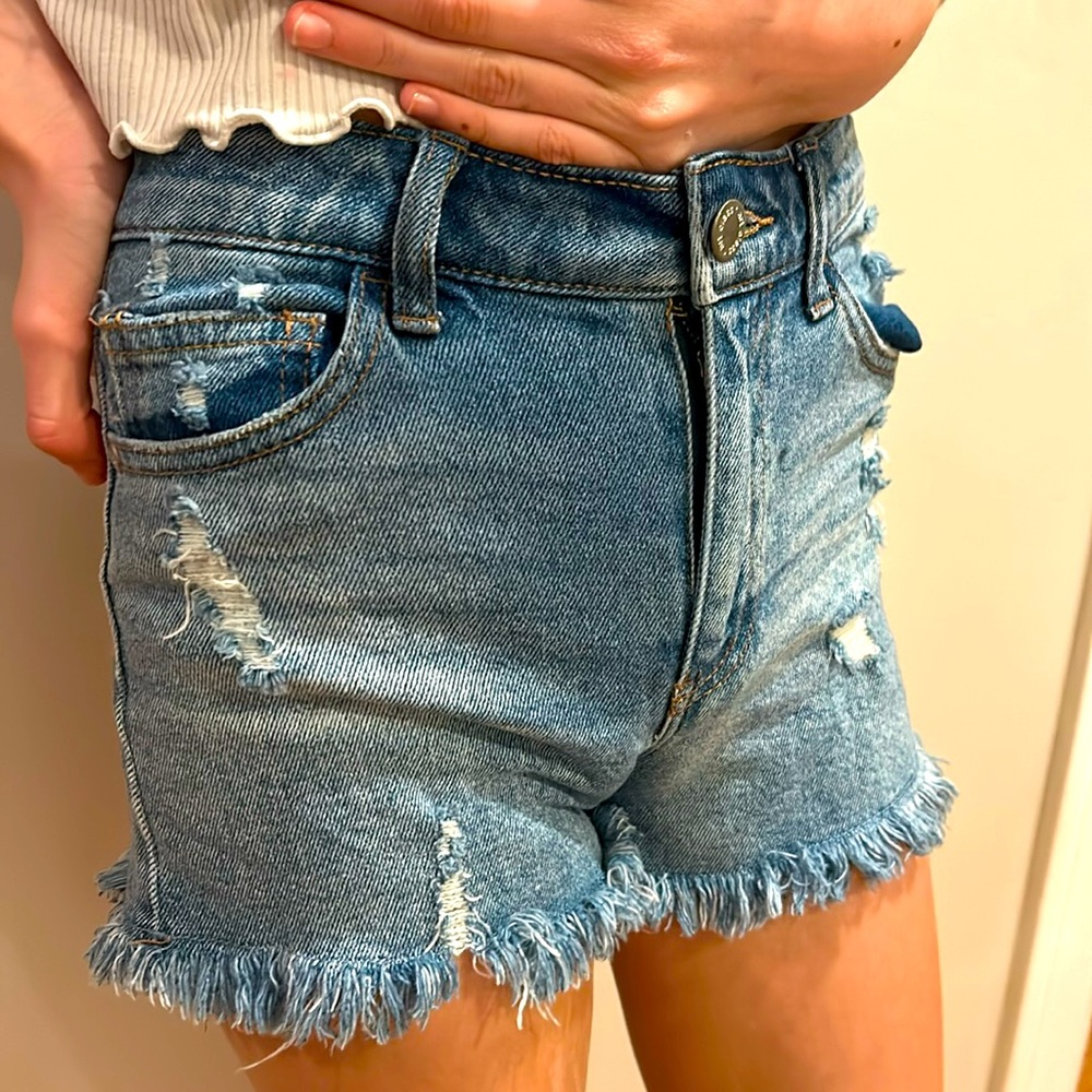 Blue ripped jeans shorts